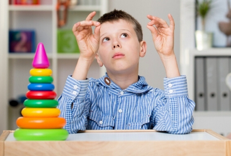 Child showing Repetitive Behaviors in Autism